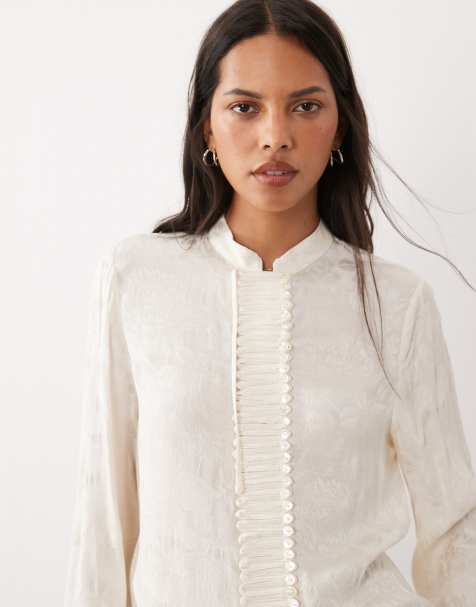 Mango blusa jacquard a collo alto a maniche lunghe con dettagli a bottoni in bianco sporco - view 1