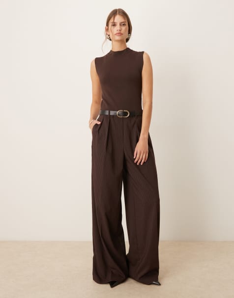 Mango – Brun, ärmlös, figursydd jumpsuit med hög krage i 2-i-1-modell - view 1