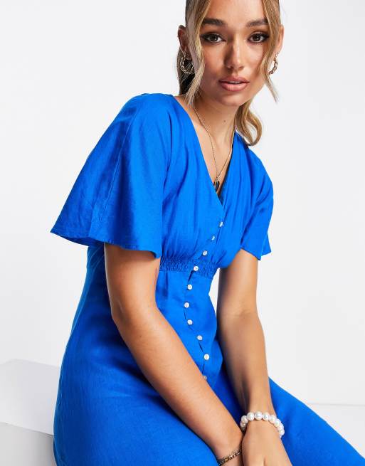 Blue shop button dress