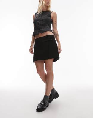 button tab mini skirt in black