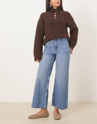 Mango - Catherin - Straight-Leg-Jeans aus Baumwollmix in Mittelblau mit Fransensaum