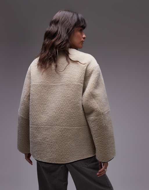 Mango contrast detail collarless faux shearling jacket in