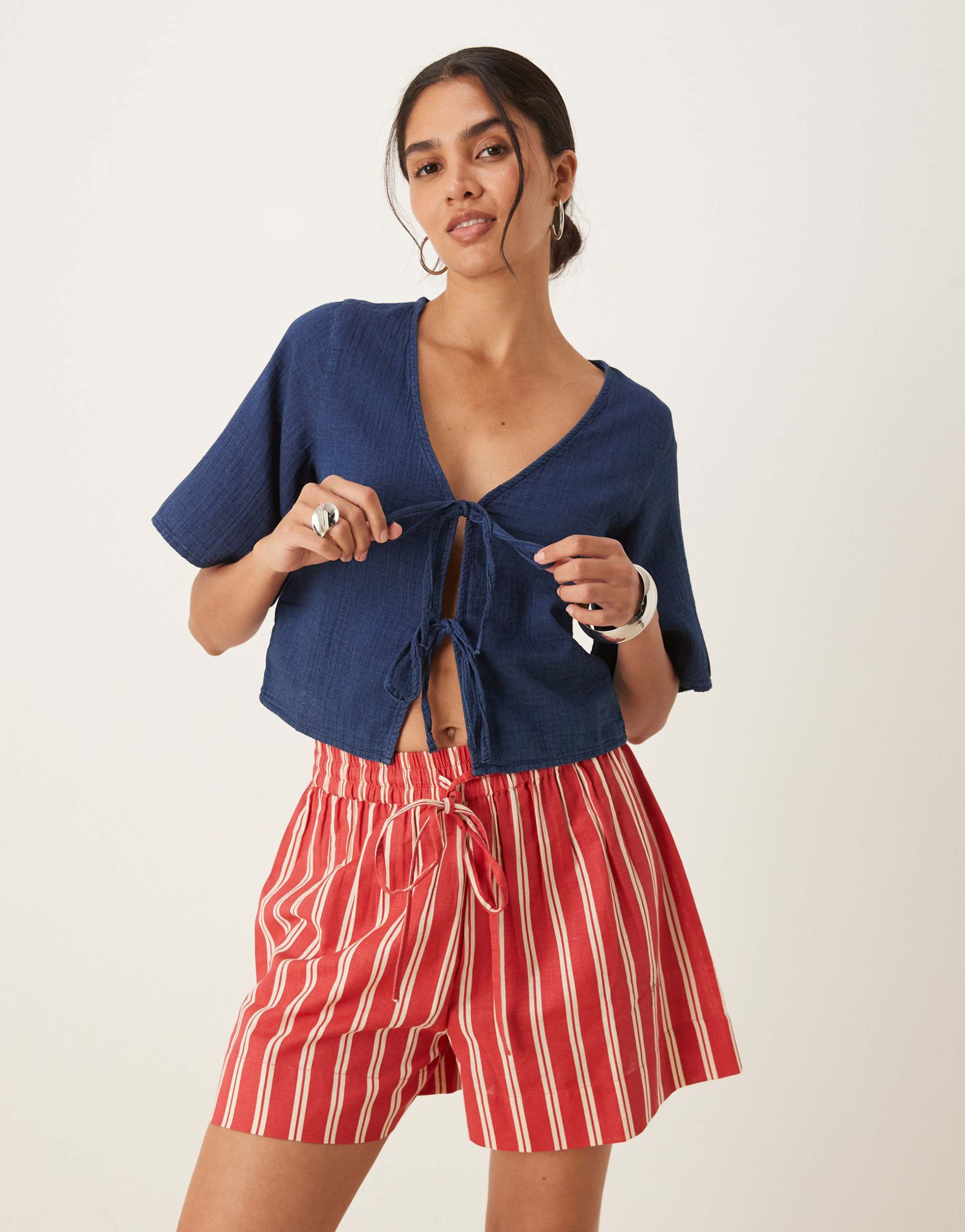 mango cropped loose fit tie front short sleeve blouse in navy