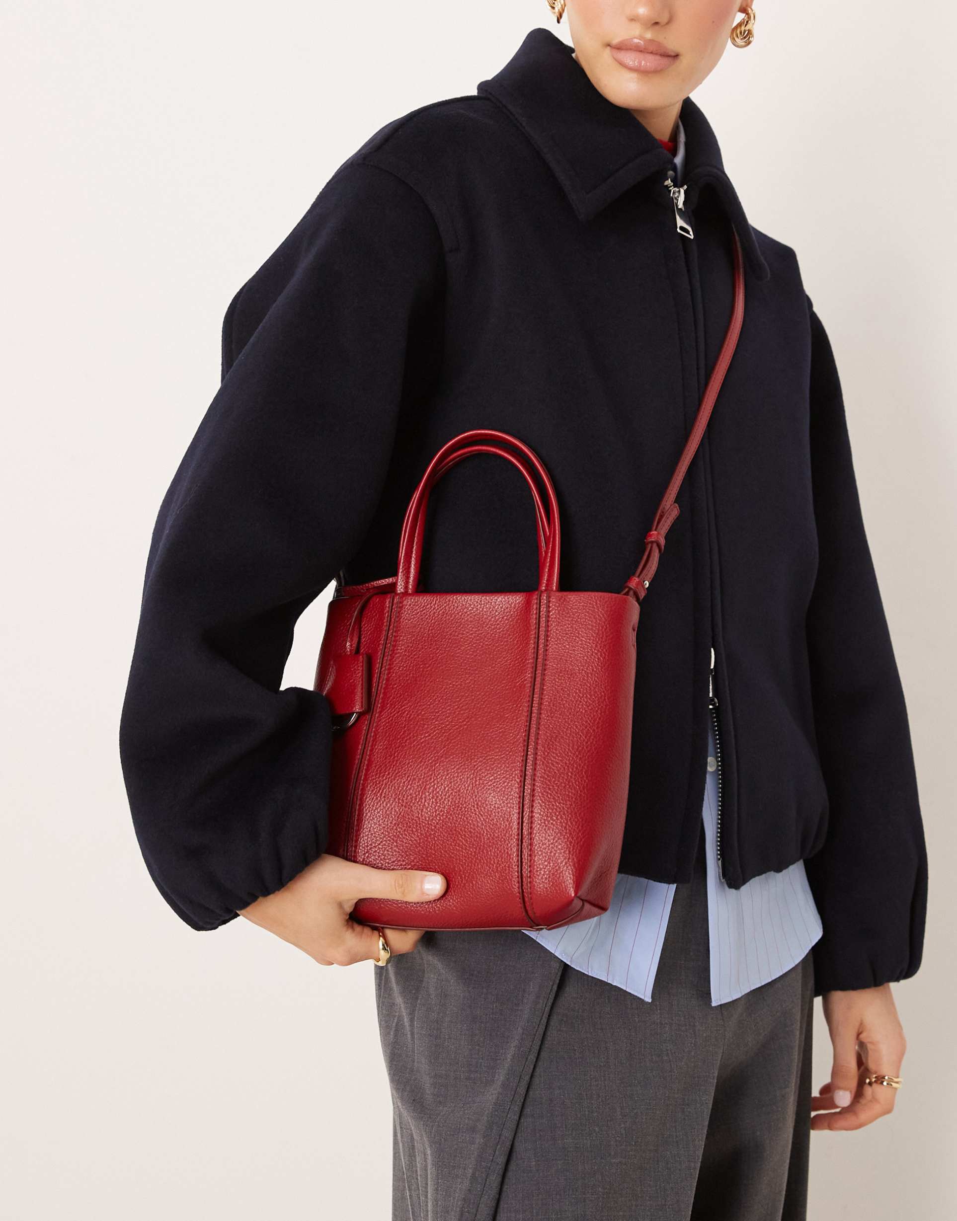 mango cross-body bag with key charm detail in red