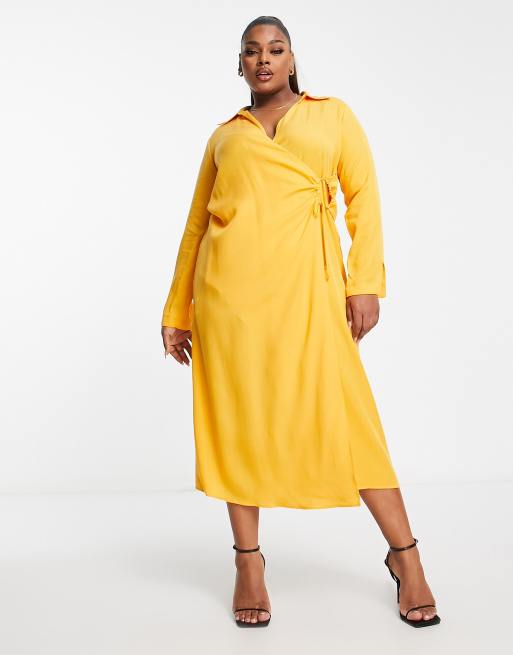 Mango Curve – Jaskrawopomarańczowa sukienka koszulowa midi z węzłem z przodu