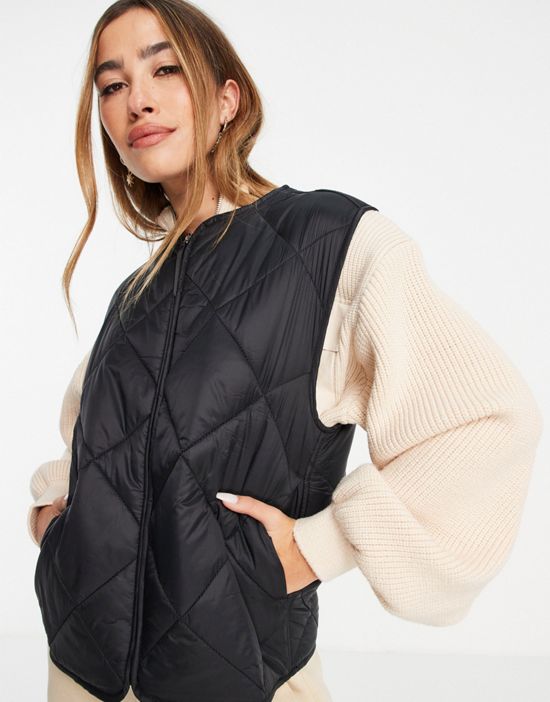 https://images.asos-media.com/products/mango-diamond-quilted-vest-in-black/201005054-4?$n_550w$&wid=550&fit=constrain