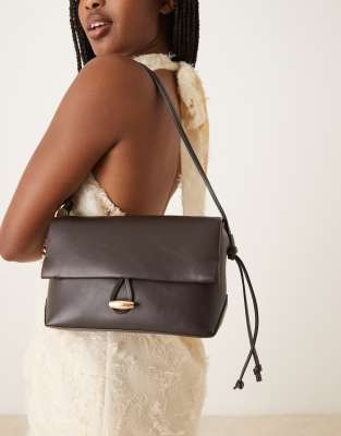 Mango elegant hand bag with gold accent fastening in black - view 1