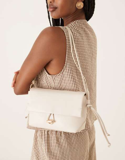Mango elegant hand bag with gold accent fastening in ivory - view 1