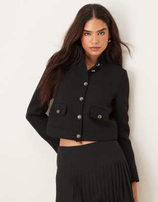 Mango - Elegante Baumwoll-Jacke mit kurzem Schnitt und goldfarbenen Knöpfen in Schwarz