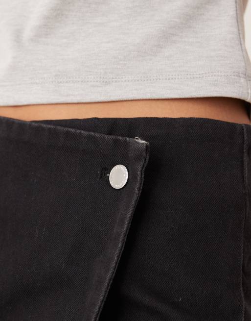 Mango – Eleganter Skort in Schwarz mit seitlichem Knopfdetail, 5 von 5