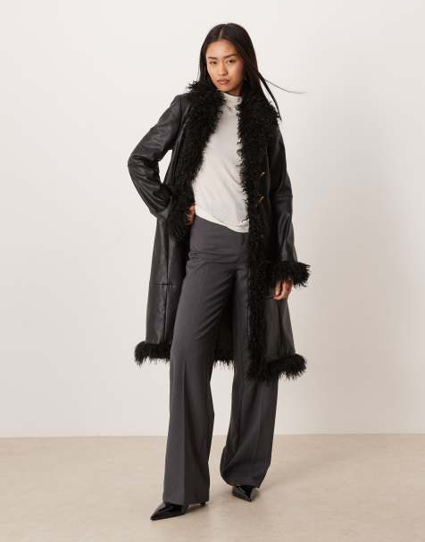 Mango faux leather long jacket with contrast shaggy trims in black - view 1