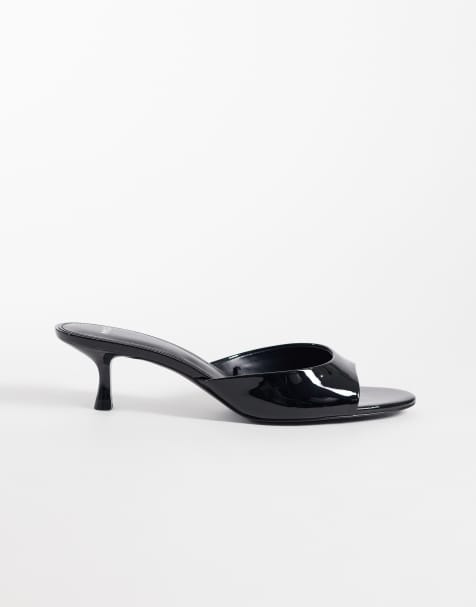 Mango faux leather low heeled mules in black - view 1