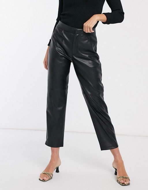 Mango faux leather panelled trousers in black