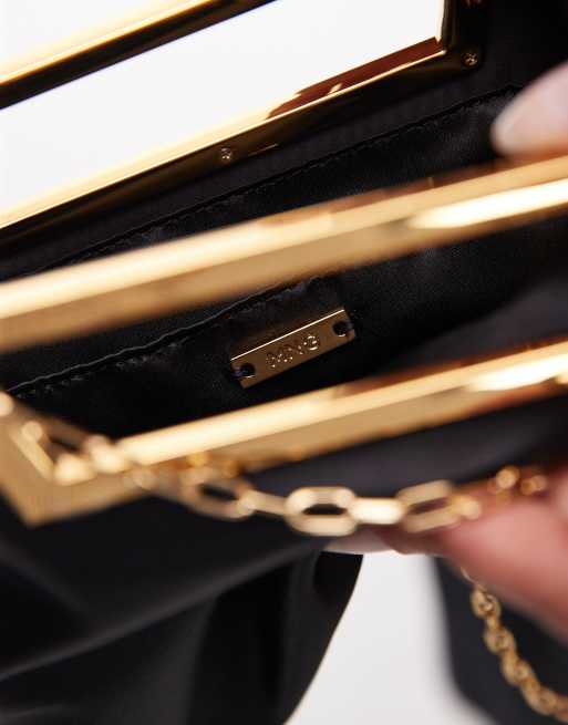 Mango featuring Kaia Gerber satin square clutch bag in black