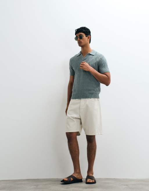 Mango - Fijngebreid poloshirt met retro textuur en split aan de kraag in oudblauw, 4 van 5