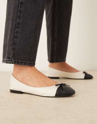 Mango - Flache Ballerinas in Schwarz und Weiß mit Schleifenverzierung