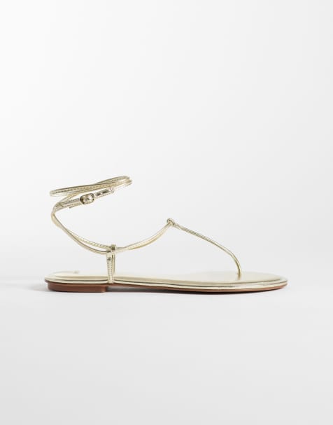 Mango – Flache Riemchensandalen in Gold mit Zehensteg - view 1