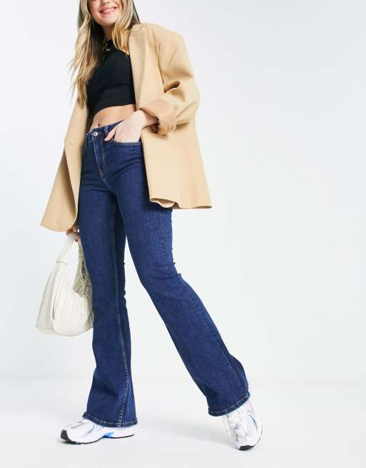 Bershka high waisted flared jeans in mid blue