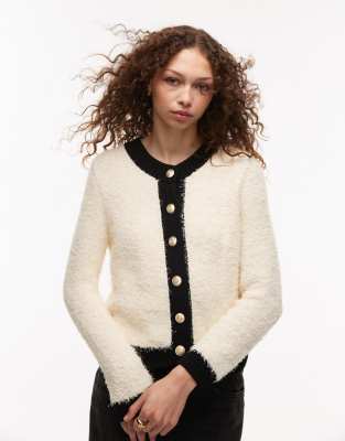 Mango - Flauschige Strickjacke in Creme und Schwarz-Bunt