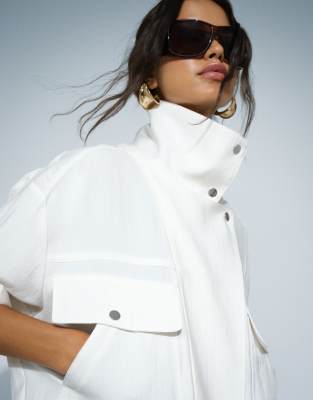 Mango Funnel Neck Jacket In White