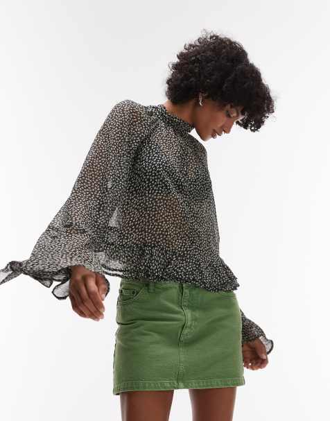 Mango – Gemusterte Bluse in Schwarz mit ausgestellten Ärmeln - view 1