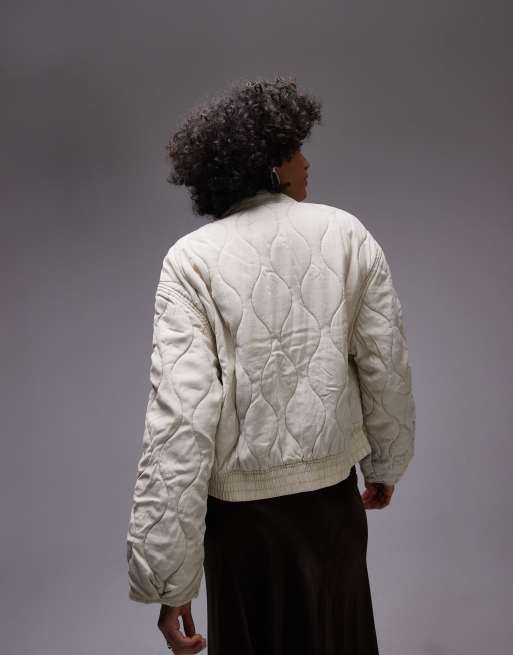 Mango – Gesteppte Bomberjacke in Ecru ASOS