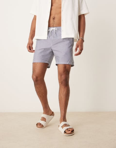 Mango – Gestreifte Seersucker-Badeshorts in Marineblau - view 1