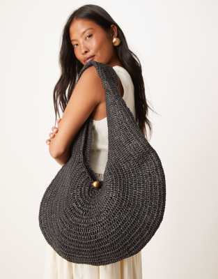 Mango - Gewebte Schultertasche in Schwarz mit U-förmigem Design und goldfarbenen Akzenten
