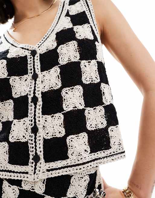 Mango - Gilet all'uncinetto a quadretti bianchi e neri in