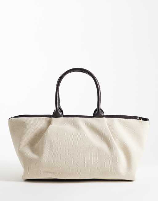 Mango – Große, weiche Schultertasche in strukturiertem Schwarz, 4 von 4