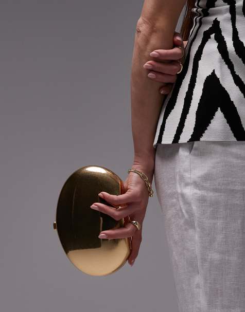 Mango – Guldfärgad, oval kuvertväska i metall - view 1