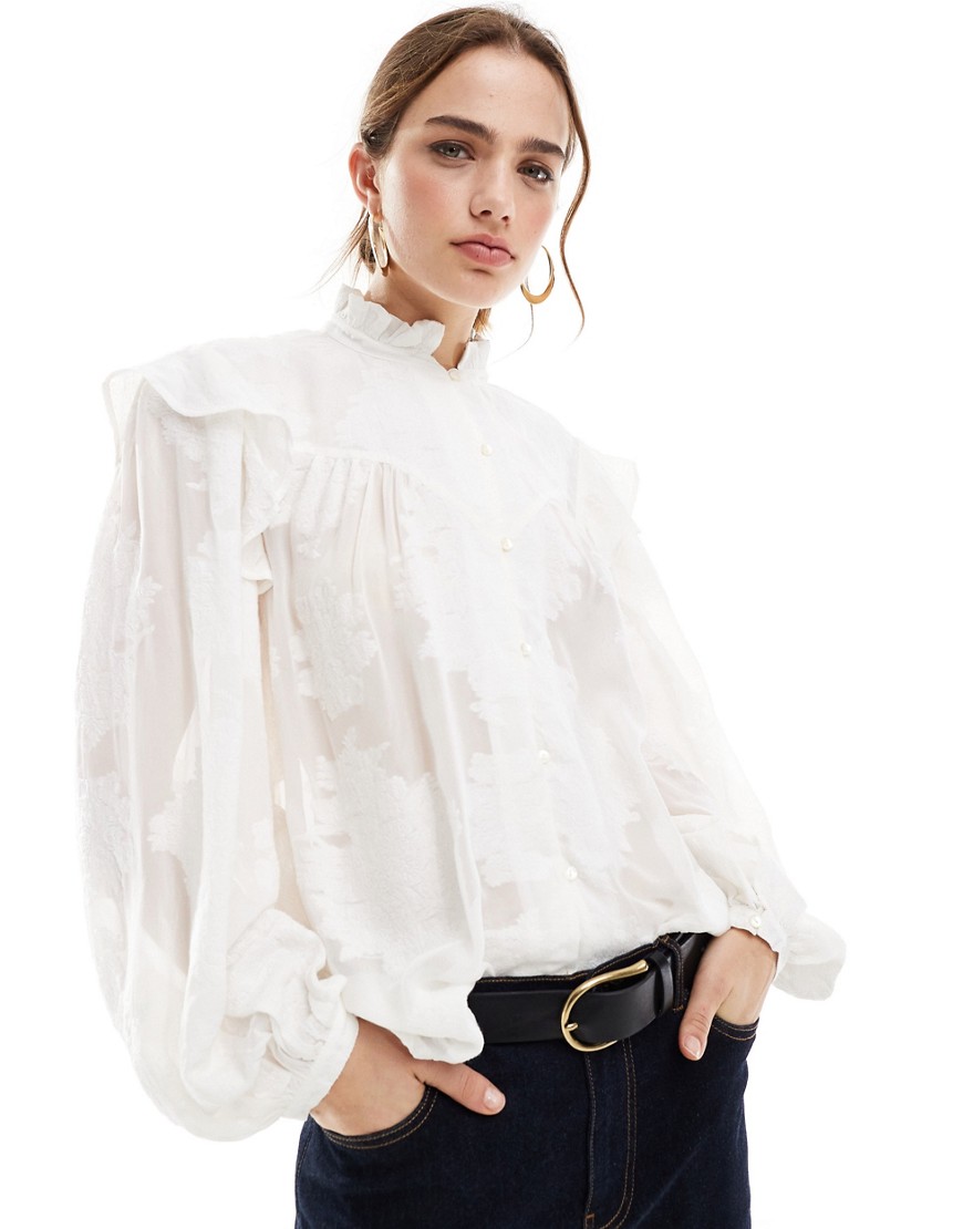 Mango high neck ruffle shoulder blouse in off white