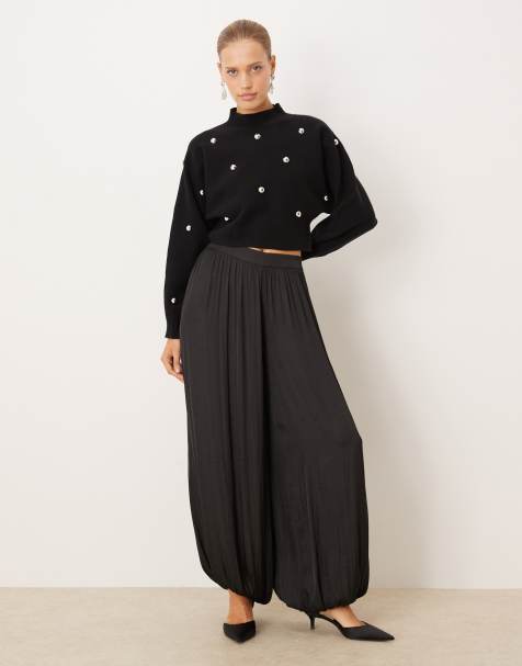 Mango – Hochgeschlossener Cropped-Pullover in Schwarz mit Metallverzierung - view 1