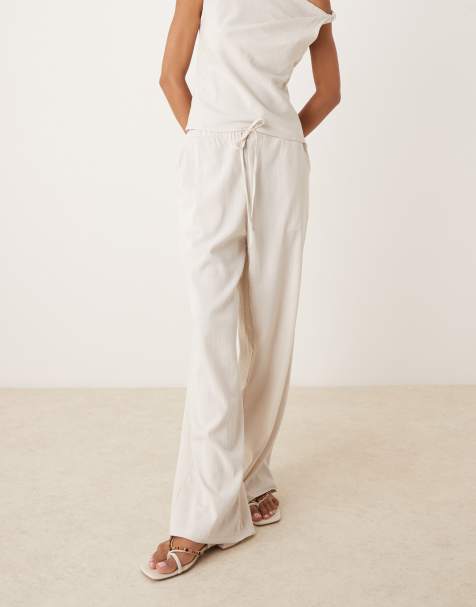 Mango - Hvidt sæt med formgivende top med snoet skulder og bukser - view 1