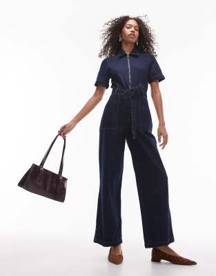 Mango - Jeans-Jumpsuit in Dunkelblau mit Reißverschluss und Bindegürtel