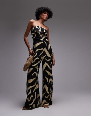 Mango - Jumpsuit in Schwarz mit Zebramuster-Mix und Carmen-Ausschnitt
