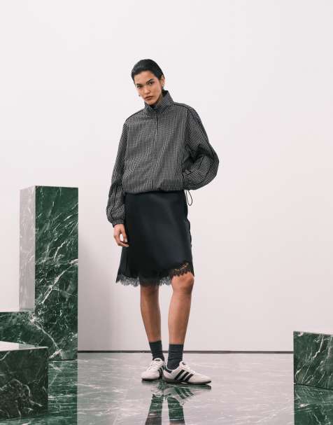 Mango knee length skirt with lace edge in black - view 1