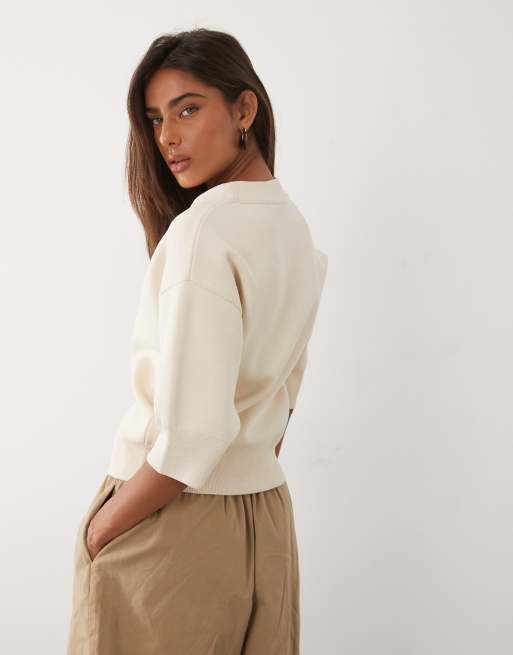 Mango – Kurzärmlige Strickjacke aus kompaktem Strick in Cremeweiß mit auffälligem Sonnenknopf , 4 von 4