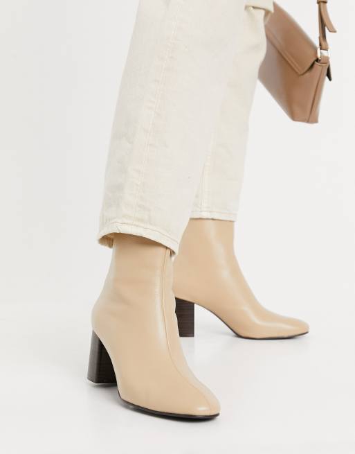 Mango leather heeled boots in beige ASOS