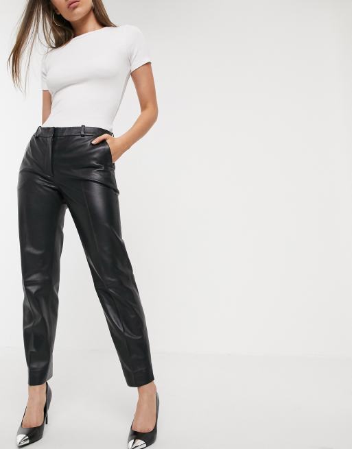 Crocodile faux-leather trousers - Woman