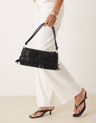 Mango - Leder-Handtasche in Schwarz mit Fransenbesatz und goldenen Akzenten