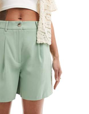 Mango linen pintuck shorts in sage green | ASOS