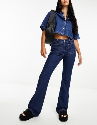 Mango Low Rise Pocket Detail Flared Jeans In Blue