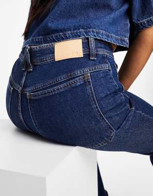 Mango Low Rise Pocket Detail Flared Jeans In Blue