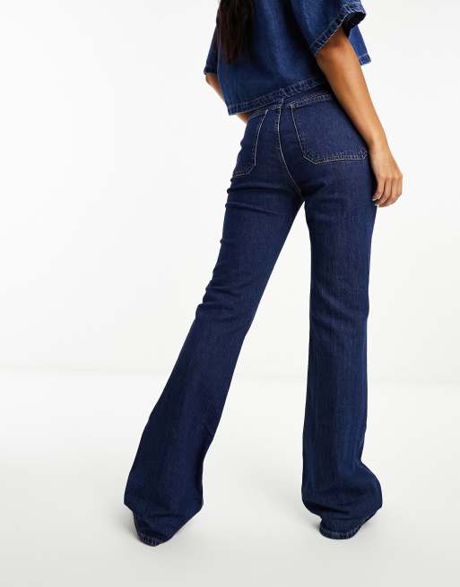 Mango low rise pocket detail flared jeans in blue denim ASOS