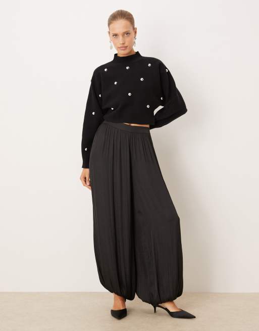 Mango - Maglione corto accollato nero con dettagli in metallo