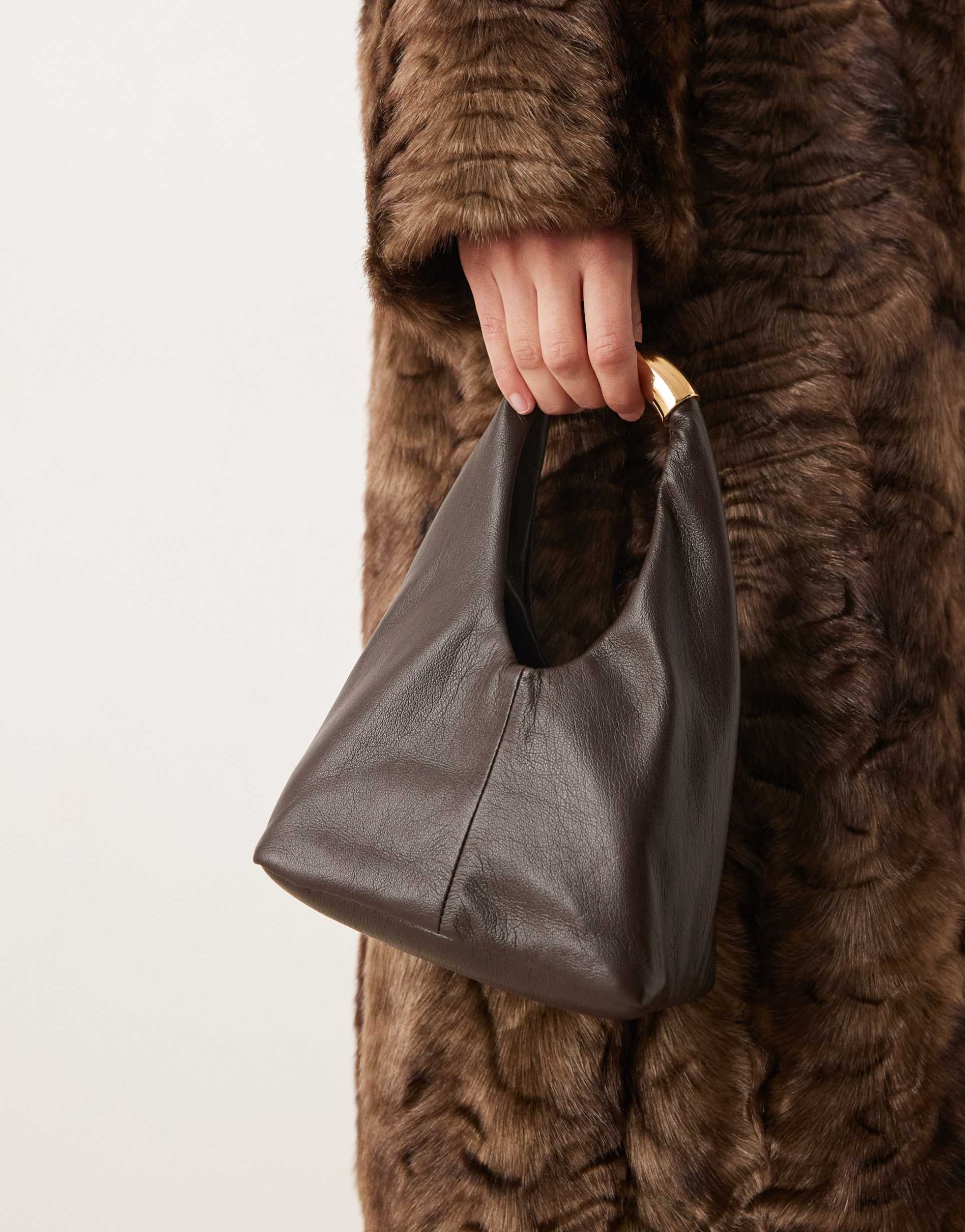 mango micro purse with gold accent in chocolate brown