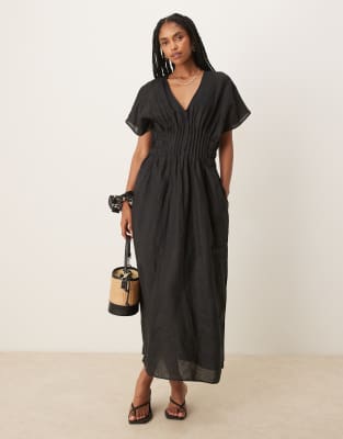 Mango - Midaxi-Kleid in Schwarz aus Ramie-Leinen-Mix mit drapierten Ärmeln, geraffter Plissee-Taille und Seitenschlitz