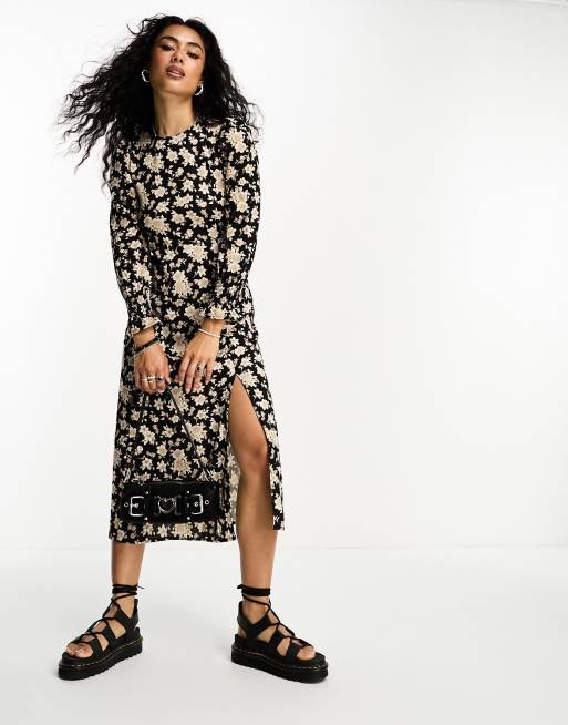 Mango - Midi jurk met gestructureerde schouders, split en lange mouwen met bloemenprint in beige en zwart