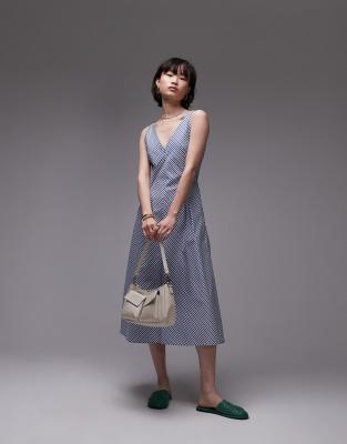 Mango - Midikleid aus Baumwolle mit blauen Streifen und V-Ausschnitt